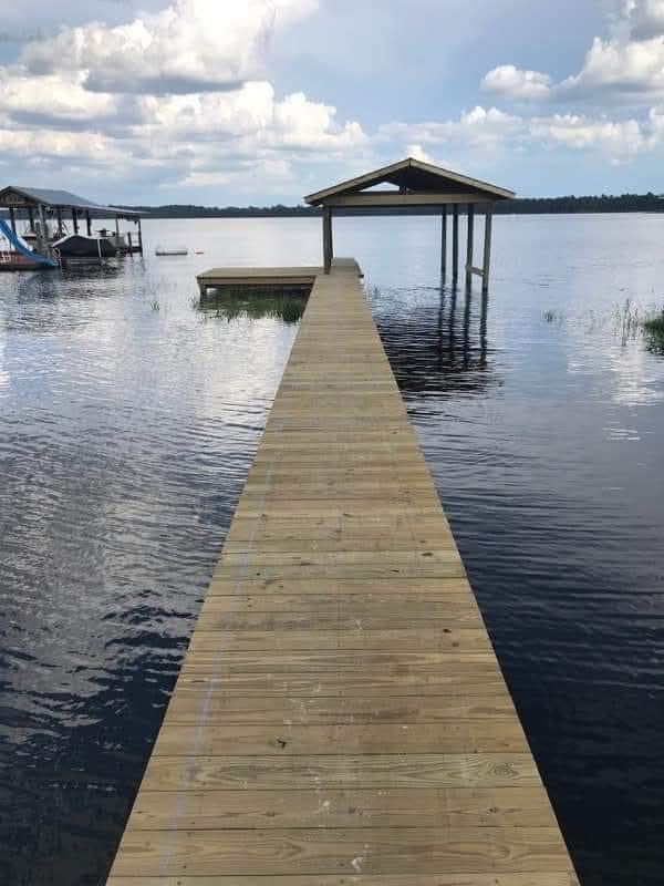 Covered boathouse over the water