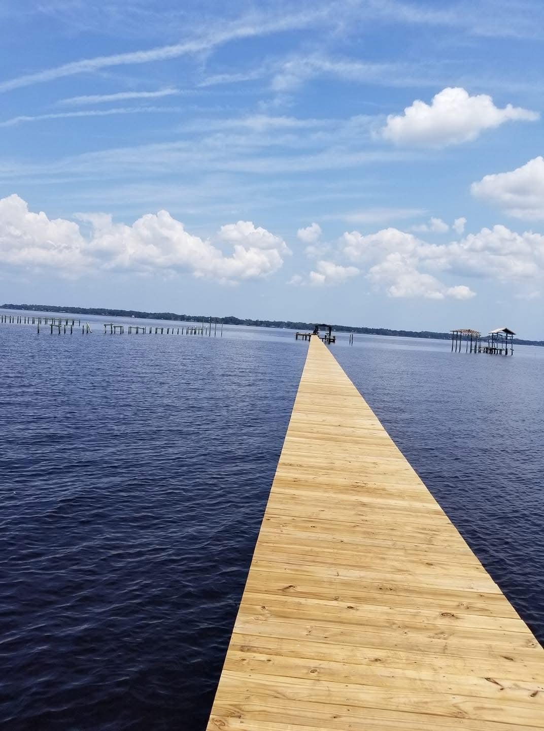 Long dock extending into open water